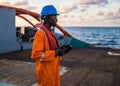 Seaman AB or Bosun on deck of vessel or ship , wearing PPE Royalty Free Stock Photo