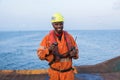 Seaman AB or Bosun on deck of vessel or ship , wearing PPE Royalty Free Stock Photo