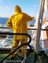 Seaman cleaning the ship. Royalty Free Stock Photo