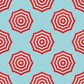 Seamles Pattern Red And White Parasols On Blue Waves Royalty Free Stock Photo