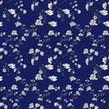 Seamles pattern of tree branch with white flowers and leaves, graphic hand drawn, blossom tree on blue background. Simple pencil Royalty Free Stock Photo