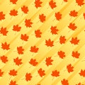 Seamless abstract background with red maple leaves. Royalty Free Stock Photo