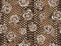 Seamless abstract floral pattern on a leopard skin texture, snake. Royalty Free Stock Photo