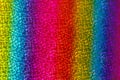 Seamless abstract glitter rainbow background of holographic paper