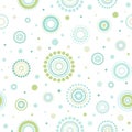 Seamless abstract pattern of circles and dots of green and turquoise colors