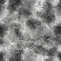 A seamless, abstract pattern featuring a cloud-like texture. Shades of gray, black, and white Royalty Free Stock Photo