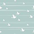 Seamless abstract pattern with flying birds on blue background with white shabby stripes Royalty Free Stock Photo