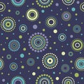 Seamless abstract pattern green, yellow and turquoise circles and dots on dark blue. Kaleidoscope background Royalty Free Stock Photo