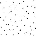 Seamless abstract pattern of little black shabby dots or spots on white