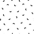 Seamless abstract pattern of little black shabby strokes or spots on white. Hand drawn, offhand style Royalty Free Stock Photo