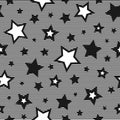 Seamless abstract pattern with little sharp black stars and lines on white background Royalty Free Stock Photo