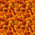 Sun-dried red and yellow tomatoes and peppers from top view. AI generative illustration