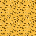 Seamless abstract pattern with symbols from ancient art in yellowish orange background