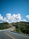 Seamless aerial view of cars driving on curved, zigzag curve road or street on mountain hill