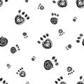 Seamless animal pattern footprint. kitten doodle icon. Endless texture can be used for wallpaper, printing on fabric, paper. Royalty Free Stock Photo