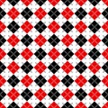 Seamless argyle pattern with dashed lines in red, black and white Royalty Free Stock Photo