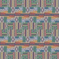 Seamless asian pattern. Ethnic and tribal motifs. Orange, red, yellow, blue and black colors. Royalty Free Stock Photo