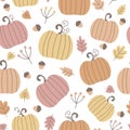 Seamless autumn pattern with pumpkins, fall leaves and acorns. Thanksgiving background. Vector illustration. Royalty Free Stock Photo