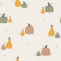 Seamless autumn pattern with pumpkins on white background. Endless repeatable texture of autumnal harvest. Colored hand