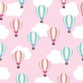 Seamless background of baby shower illustration with cute pink and blue hot air balloon on pink sky suitable for baby wallpaper Royalty Free Stock Photo