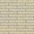 Seamless background of beige bricks. Seamless old sandstone brick wall background texture. Tileable antique vintage stone blocks Royalty Free Stock Photo