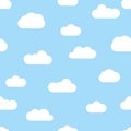 Seamless background with blue sky and white cartoon clouds Royalty Free Stock Photo