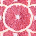 Seamless background with grapefruit slices Royalty Free Stock Photo