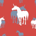 Seamless background of silhouettes of unicorns on colored background