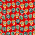 Seamless background with colorful skulls