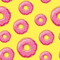 Seamless background with donuts with pink glaze