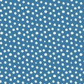 Seamless background in doodle style with hand drawn polka dots on a blue background. Creative minimalist artistic background Royalty Free Stock Photo