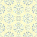 Seamless background with floral pattern. Beige background with light blue and green flower elements Royalty Free Stock Photo