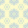 Seamless background with floral pattern. Beige background with light blue and green flower elements Royalty Free Stock Photo