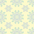 Seamless background with floral pattern. Beige background with light blue and green flower elements Royalty Free Stock Photo