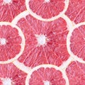 Seamless background with grapefruit slices Royalty Free Stock Photo