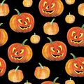 Seamless background with halloween pumpkins. Watercolor pattern.