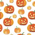 Seamless background with halloween pumpkins. Watercolor pattern.