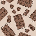 Seamless background with a pattern of hand drawn pieces of chocolate