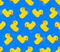 Seamless background pattern of yellow rubber ducks