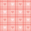 Seamless background. Pink checkered wallpaper with hearts.