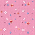 Seamless background of pink denim with scattered buttons