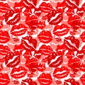 Seamless background with red prints of lipstick