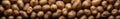 Seamless background of scattered tubers of ripe potatoes. Generated by AI