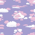 Seamless background of silhouettes white and pink clouds in lilac evening sky Royalty Free Stock Photo