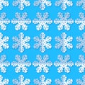 Seamless background with snowflakes. White paper snowflakes with shadow on blue background. Winter pattern. Royalty Free Stock Photo