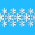 Seamless background with snowflakes. White paper snowflakes with shadow on blue background. Winter pattern. Royalty Free Stock Photo