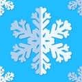 Seamless background with snowflakes. White paper snowflakes with shadow on blue background. Winter pattern. Royalty Free Stock Photo