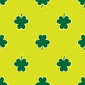 Seamless background to the day of Patrick. clover leaves on a green background.