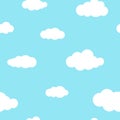 Seamless background with white clouds on powder blue sky. Royalty Free Stock Photo