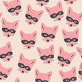 Seamless bandit fox pattern. Stylish repeating texture. Repeating texture with fox heads. Pink and beige background.